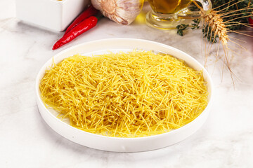 Raw dry Italian pasta Vermicelli