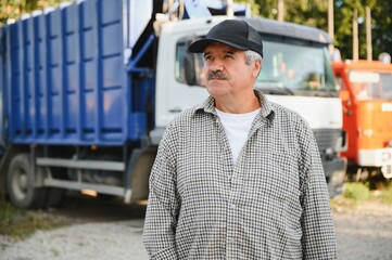 Portrait of a male garbage truck driver