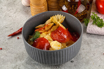 Italian pasta farfalle with pepperoni