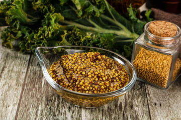 Mustard sauce with seeds in the bowl