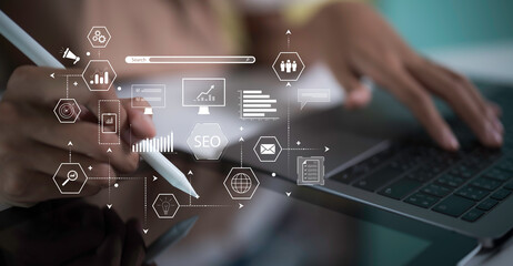 Digital marketing commerce online sale concept.Businesswoman using computer for analysis SEO Search Engine Optimization Marketing Ranking Traffic Website Internet Business Technology Concept