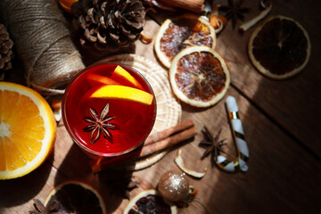 Mulled wine with fresh orange sliced. Traditional hot drink in Christmas time.