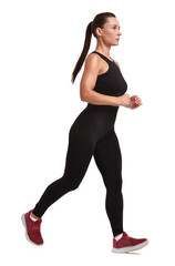 Woman in sportswear running on white background