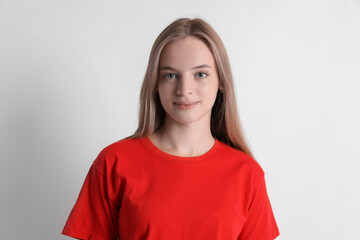 Fototapeta premium Portrait of teenage girl on white background