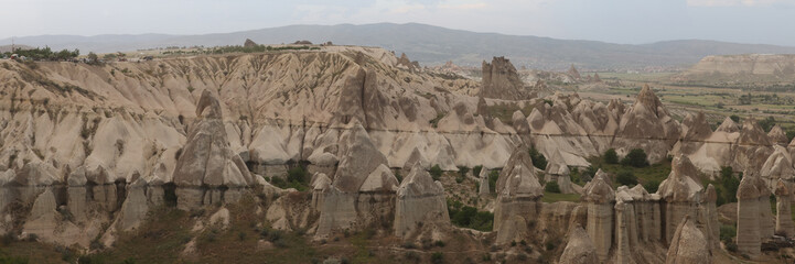Giant rock and sand formations in touristic Cappadocia