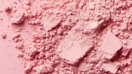 Obraz premium A tight shot of a powdery surface against a pink backdrop, featuring a distinct white mark in its center