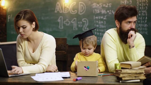 Kids learn and study in home school. Family school and kids home schooling. Little child back to school at knowledge day.