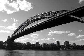 Obraz premium Curved Bridge - Architectural Wonder Over Sydney Harbor River
