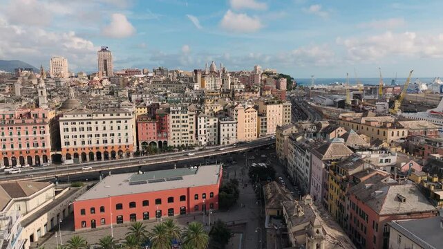 Porto Antico in Genoa, Italy, with historic buildings, harbor views, and the iconic Bigo structure
