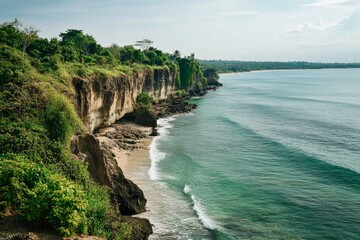 An expansive coastline merges seamlessly with the boundless sea, stretching beyond the horizon and creating a scene of endless beauty and timeless peace.