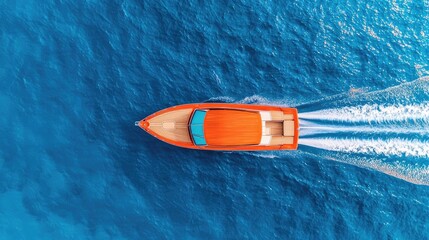 Fototapeta premium Orange speedboat sailing across clear blue ocean waters.