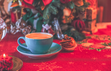 Winter Holidays concept. Christmas and New Year scene, cozy candles burning at home, and other decoration