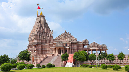 View of the newly built Shree Khondaldham Temple with carved sculptures of Hindu deities, Kagvad,...