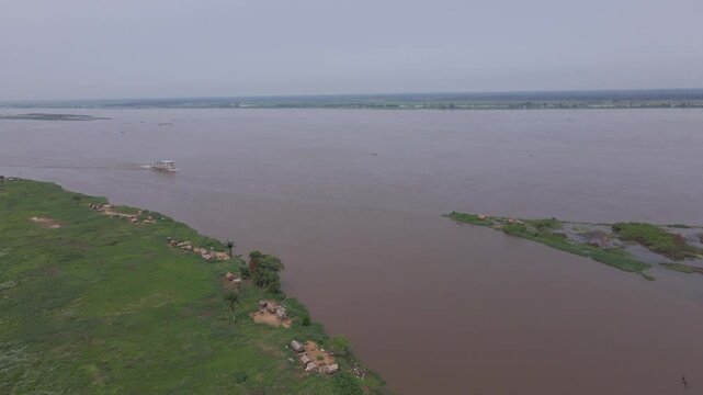 Aerial view of the congo basin rainforest, revealing the river running through it
