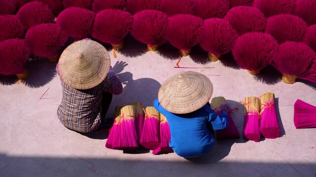 Quang Phu Cau village in Hanoi, Vietnam is famous for its century old craft of making incense. Drying incense sticks in Quang Phu Cau handicraft village.