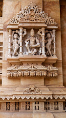 Carved sculpture of Lord Vishnu sitting on Garuda, his vahana, at Shri Trinetreshwar Mahadev Temple, Taranetar, Surendranagar, Gujarat, India.