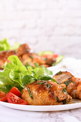 Chicken thigh with gravy and vegetable side dish