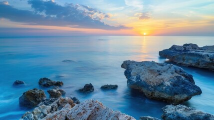 Sunrise Over the Sea with Rocks