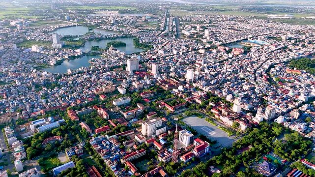 Aerial view of Nam Dinh city with many houses, buildings and lakes