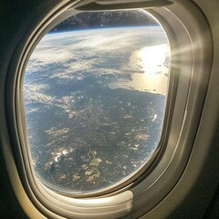 Naklejka premium Aerial view of the Earth from airplane window