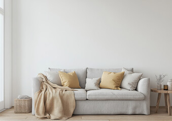 Cozy gray sofa adorned with soft pillows and warm throw blanket, set in bright, minimalist living room. natural light enhances inviting atmosphere