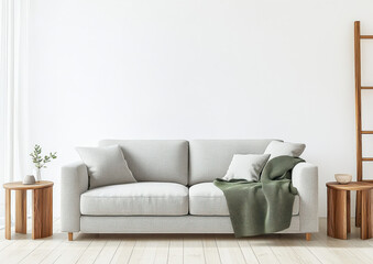 cozy living room featuring light gray sofa adorned with green blanket, complemented by wooden side tables and minimalist decor. serene atmosphere invites relaxation and comfort