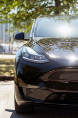Modern black electric car parked in the city