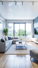Fototapeta premium Modern living room featuring a comfortable couch, large windows, and a TV, creating a bright and inviting atmosphere 