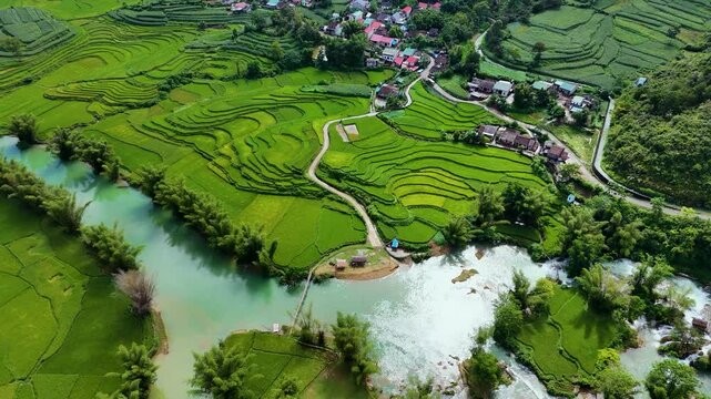 Aerial landscape in Quay Son river, Trung Khanh, Cao Bang, Vietnam with nature, green rice fields and rustic indigenous houses