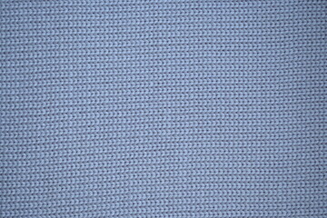 texture of knitted light blue sweater, close-up texture of beige knitted fabric, macro texture of blue knitted woolen clothes