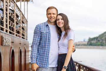 Love on the ship, couple in love hug on a yacht at sea