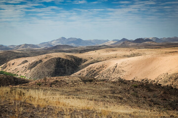Breathtaking panoramic view of the rolling hills and unique landscapes in Iona National Park Angola under a clear blue sky