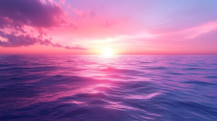 Obraz premium A beautiful sunset over the ocean with pink and purple hues