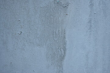 old gray cracked wall texture as background, old spackled textured gray white wall as background 