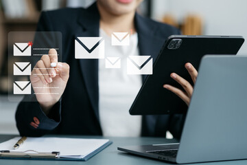 Email notification concept, Female use smartphone and laptop receive message alert in the mailbox