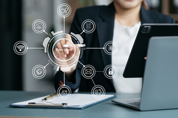 Zero trust security concept Person using computer and tablet with zero trust icon on virtual screen...