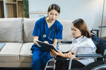 Obraz premium Concept of caring for the disabled, nurses help patients during their recovery period on wheelchair.