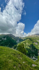 Fototapeta premium Majestic mountain landscape under a vibrant blue sky, perfect for exploring nature, environmental awareness, or Earth Day celebrations