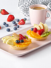 Fruit cream dessert white background, isolated.