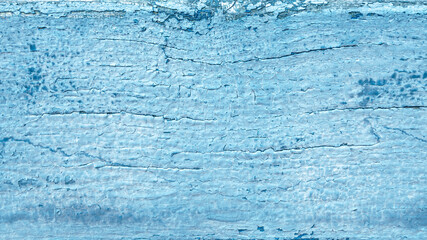 abstract background of an old wooden texture painted light blue close up