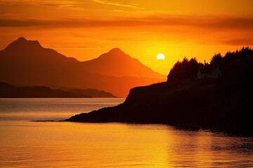 Fototapeta premium Late Sunset on the Isle of Mull, Scotland. Fiery Sun Colors Illuminate Evening Sky