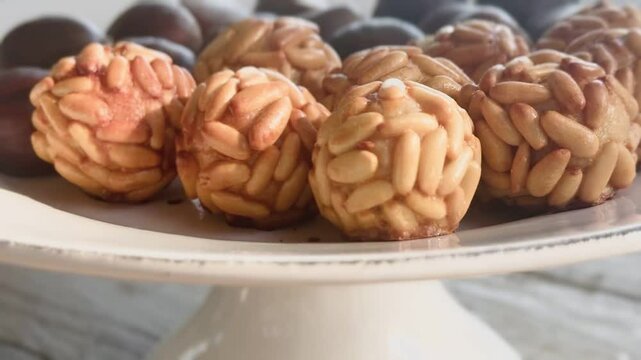 Typical Spanish pastries in Catalonia on All Saints' Day. Freshly baked Panallets on the tray.