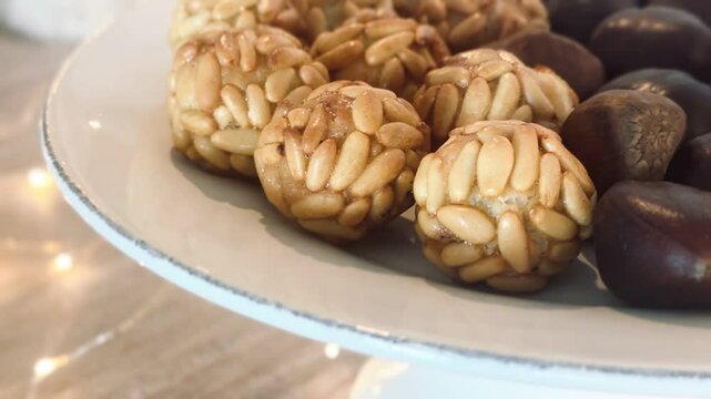 Typical Spanish pastries in Catalonia on All Saints' Day. Freshly baked Panallets on the tray.