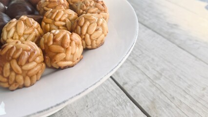Freshly baked Panallets. Typical Spanish pastries in Catalonia on All Saints' Day. 