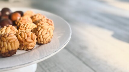 Freshly baked Panallets. Typical Spanish pastries in Catalonia on All Saints' Day. 