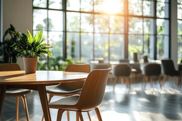 Fototapeta premium Bright conference room with natural light flooding through large windows, featuring sleek wooden furniture for a modern, open space
