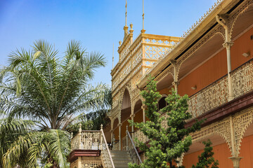 Beautiful architecture of the iconic Palácio de Ferro in Luanda Angola showcasing intricate ironwork against a clear blue sky