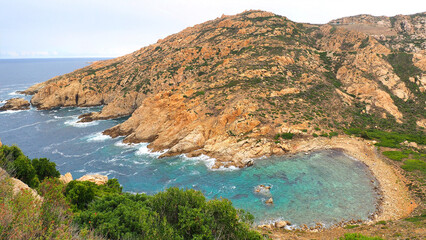 Near Calvi, Corsica (nicknamed the Isle of Beauty), Rossi da Legnano beach is a hidden gem with turquoise waters. To reach this natural paradise, the best way is to come by boat