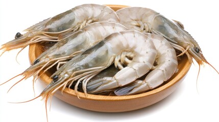 Fresh white shrimp elegantly arranged in a rustic wooden bowl on a pristine white background, showcasing nature's delicacy