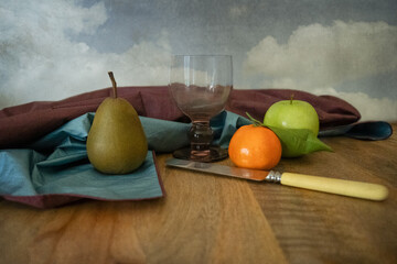 still life with apple pear and mandarine